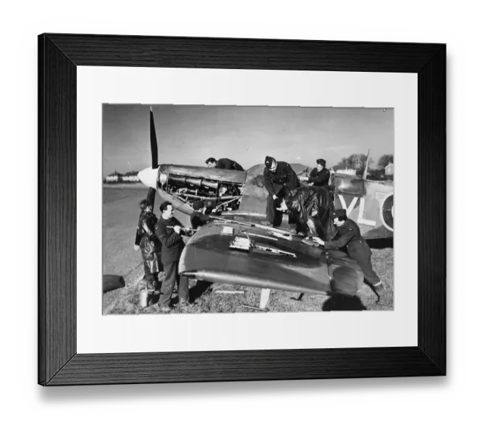 Framed Print : A clipped wing Spitfire of the Royal Air Force being serviced at a Fighter Command
