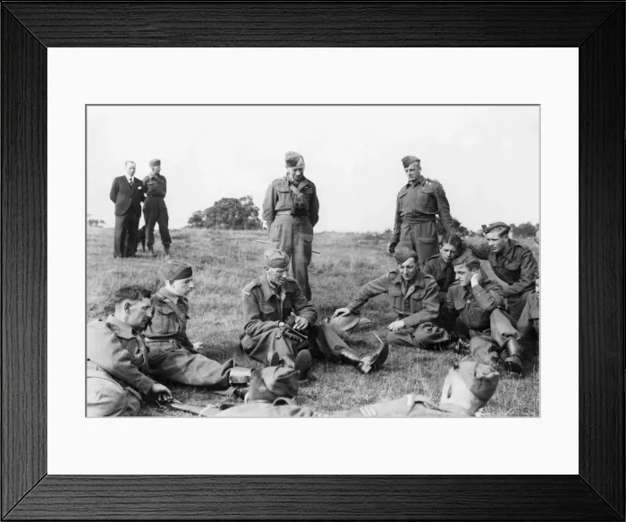 Framed Print : A veteran from the previous war gives instructions on how to use a Tommy gun at a Home Framed Print : A veteran from the previous war gives instructions on how to use a Tommy gun at a Home