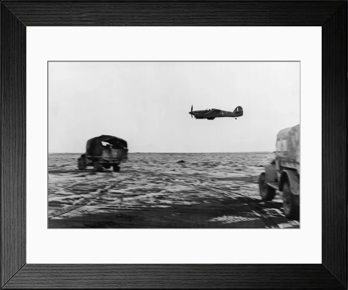 Framed Print : Fighter support planes circle round a New Zealand column in the Western Desert during Framed Print : Fighter support planes circle round a New Zealand column in the Western Desert during