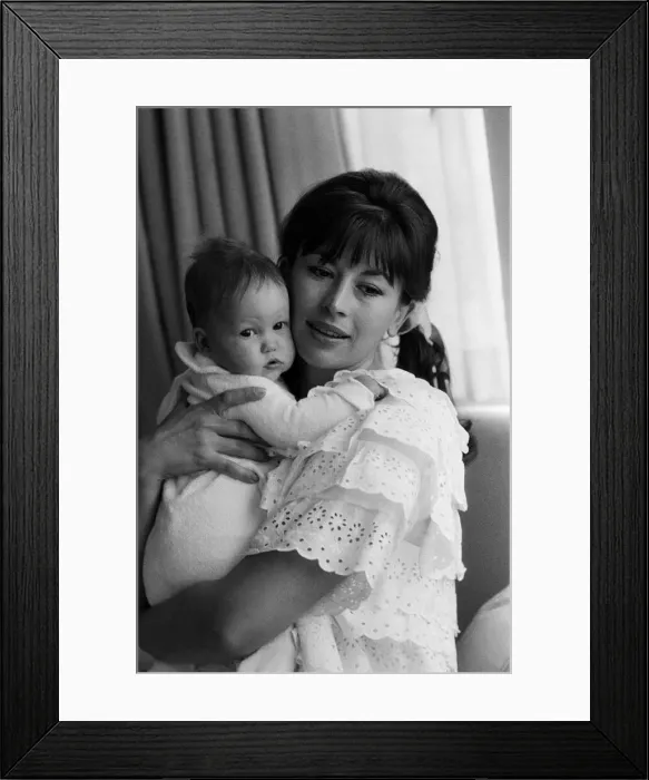 Framed Print : Actress Nanette Newman with her 4 month old daughter Emma at their home in Virginia Water Framed Print : Actress Nanette Newman with her 4 month old daughter Emma at their home in Virginia Water