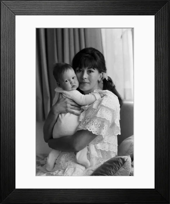 Framed Print : Actress Nanette Newman with her 4 month old daughter Emma at their home in Virginia Water Framed Print : Actress Nanette Newman with her 4 month old daughter Emma at their home in Virginia Water
