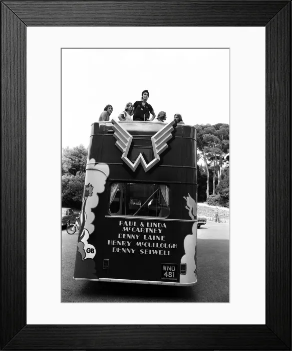 Framed Print : Paul McCartney and his wife Linda in Paris, France, with other members of the group Wings Framed Print : Paul McCartney and his wife Linda in Paris, France, with other members of the group Wings