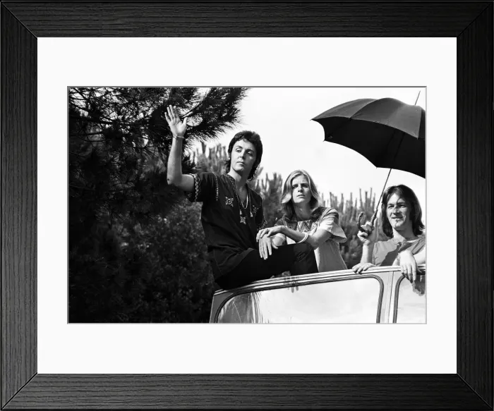 Framed Print : Paul McCartney and his wife Linda in Paris, France, with other members of the group Wings Framed Print : Paul McCartney and his wife Linda in Paris, France, with other members of the group Wings