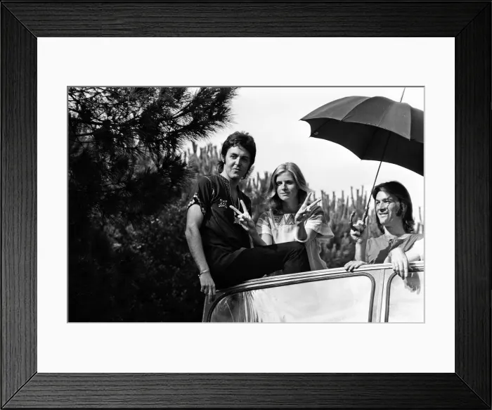 Framed Print : Paul McCartney and his wife Linda in Paris, France, with other members of the group Wings Framed Print : Paul McCartney and his wife Linda in Paris, France, with other members of the group Wings