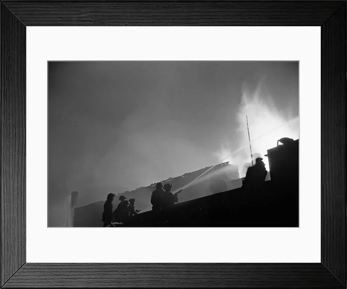 Framed Print : Firefighters tackle a blaze in a Timber Yard in Camberwell, London Framed Print : Firefighters tackle a blaze in a Timber Yard in Camberwell, London