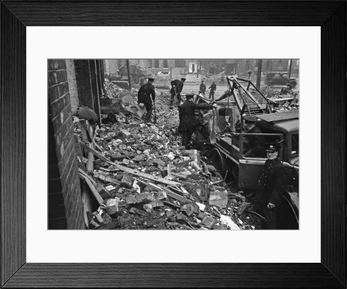 Framed Print : Firefighters clear fire appliances, hoses and ladders buried under debris at Carreras Framed Print : Firefighters clear fire appliances, hoses and ladders buried under debris at Carreras