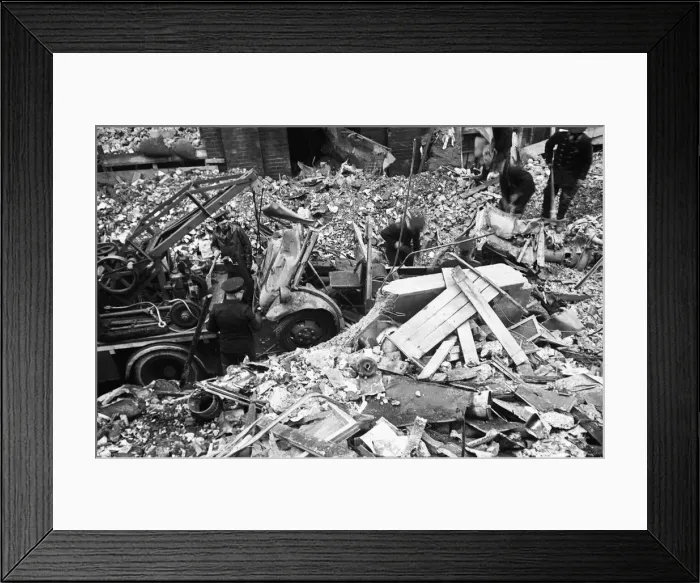 Framed Print : Firefighters clear fire appliances, hoses and ladders buried under debris at Carreras Framed Print : Firefighters clear fire appliances, hoses and ladders buried under debris at Carreras