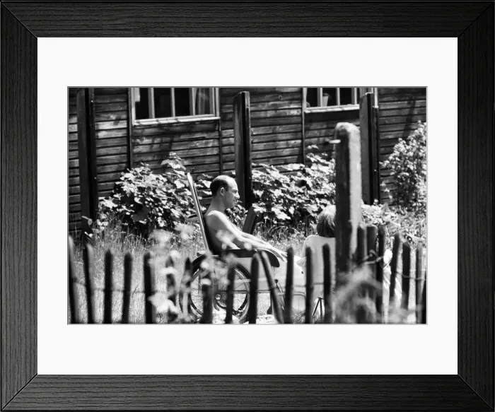 Framed Print : Stirling Moss talking to his friend Graham Hill while recovering at the Atkinson Morley Framed Print : Stirling Moss talking to his friend Graham Hill while recovering at the Atkinson Morley