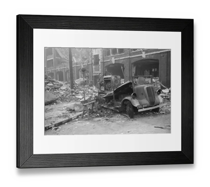 Framed Print : Fire appliances, hoses and ladders buried under debris at Carreras Tobacco Company