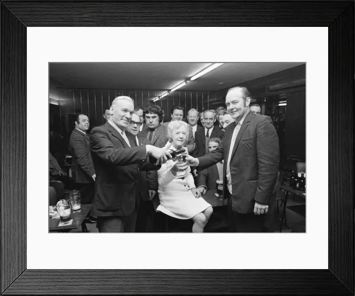 Framed Print : Barmaid retires in Billingham, enjoying a celebration drink with customers, 1973