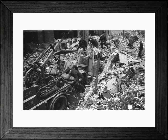 Framed Print : Firefighters clear fire appliances, hoses and ladders buried under debris at Carreras Framed Print : Firefighters clear fire appliances, hoses and ladders buried under debris at Carreras