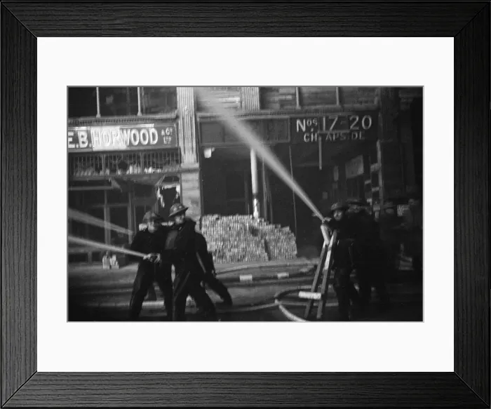 Framed Print : Firemen fighting fires in Cheapside, London, started by incendiary bombs dropped in their