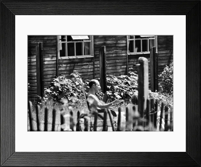 Framed Print : Stirling Moss talking to his friend Graham Hill while recovering at the Atkinson Morley Framed Print : Stirling Moss talking to his friend Graham Hill while recovering at the Atkinson Morley