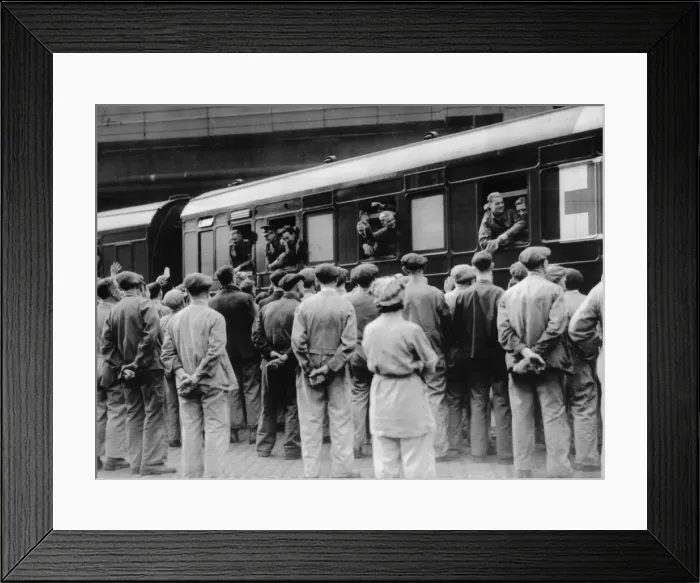 Framed Print : A group of workmen cheer some of the repatriated and wounded prisoners Framed Print : A group of workmen cheer some of the repatriated and wounded prisoners