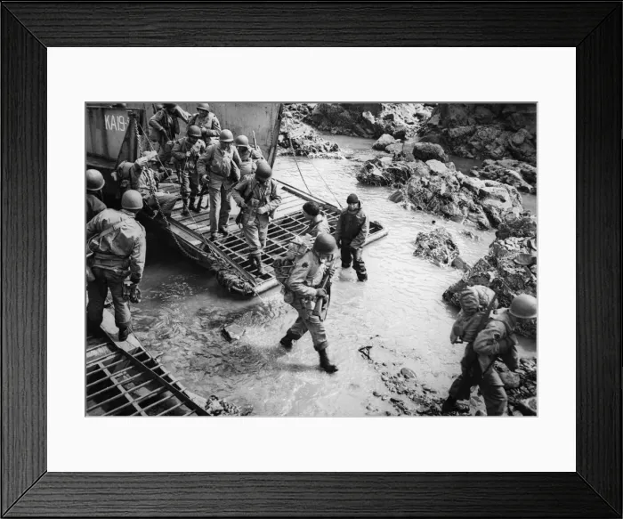 Framed Print : These soldiers stride off their landing craft onto the rocky shores of Kiska Island Framed Print : These soldiers stride off their landing craft onto the rocky shores of Kiska Island