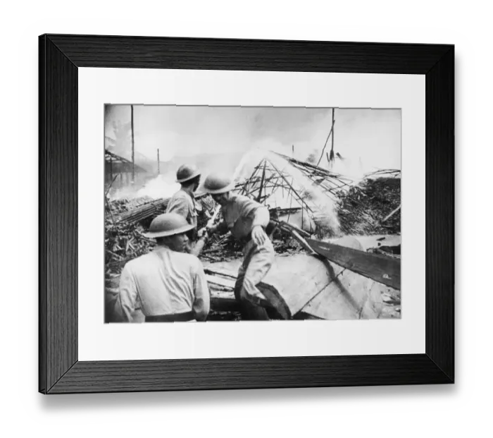 Framed Print : Last Days at Singapore. Civil defence workers fight the flames Framed Print : Last Days at Singapore. Civil defence workers fight the flames