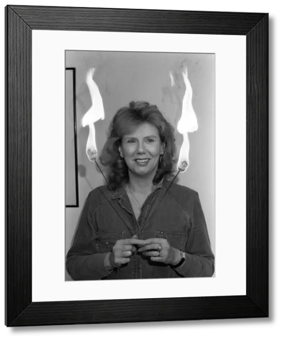 Framed Print : Actress Anna Karen practising her fire-eating act at her home in Ilford, Essex Framed Print : Actress Anna Karen practising her fire-eating act at her home in Ilford, Essex