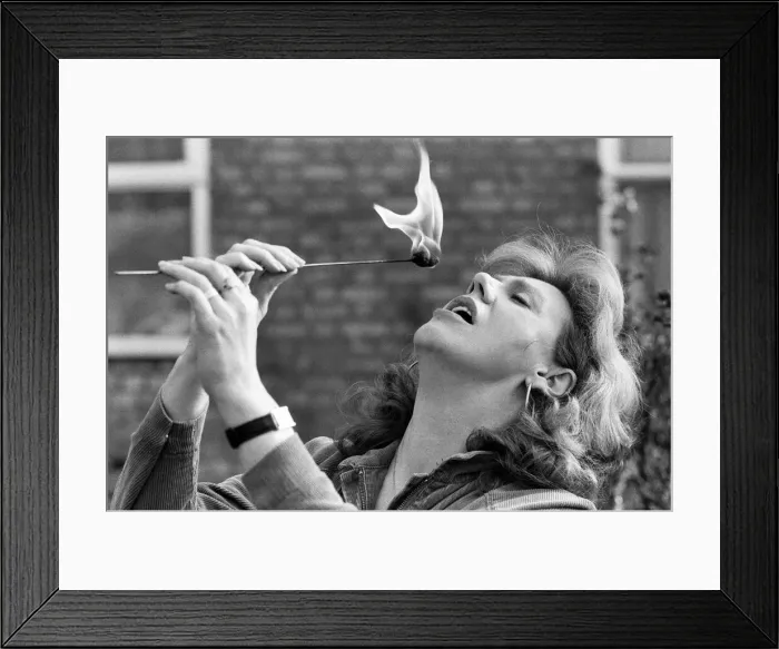 Framed Print : Actress Anna Karen practising her fire-eating act at her home in Ilford, Essex Framed Print : Actress Anna Karen practising her fire-eating act at her home in Ilford, Essex