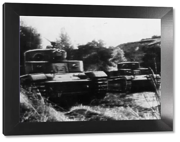Concealed Soviet tanks move into action. This picture taken when Russia had