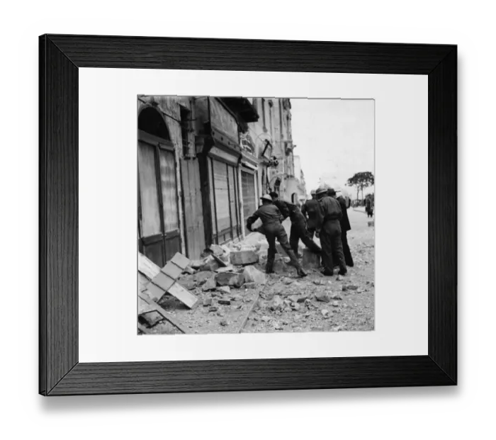 Framed Print : Maltese police helping to clear debris after an air raid. March 1942 Framed Print : Maltese police helping to clear debris after an air raid. March 1942