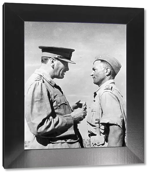 Commander in Chief Sir Claude Auchinleck chats with Lieutenant C. H