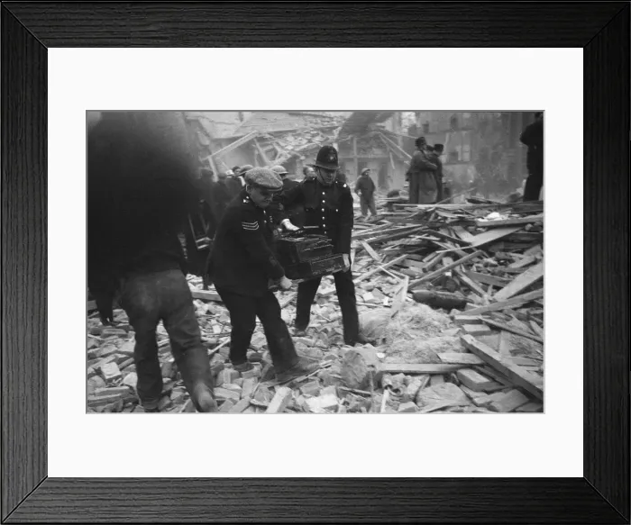 Framed Print : Police officers recover a cash register following a V2 attack on Sidmouth Street