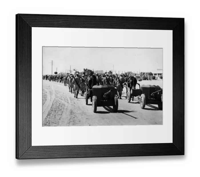 Framed Print : Moving up to the front line. New Zealand infantry marching through the choking sand of Framed Print : Moving up to the front line. New Zealand infantry marching through the choking sand of