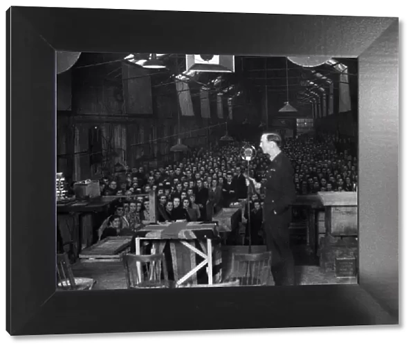 A Royal Air Force officer addressing workers at a factory near Reading