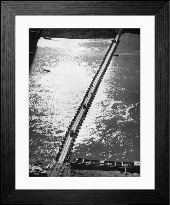 Framed Print : Aerial view of the 1st US Army Trucks and equipment rolling across a pontoon bridge over Framed Print : Aerial view of the 1st US Army Trucks and equipment rolling across a pontoon bridge over