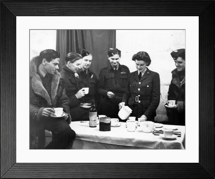 Framed Print : Bomber crews enjoying tea after a night raid on Germany. Circa September 1941 Framed Print : Bomber crews enjoying tea after a night raid on Germany. Circa September 1941