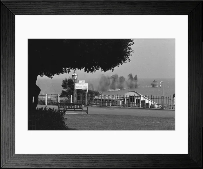 Framed Print : German shells explode harmlessly in the English Channel off the coast at Lea Cliff Framed Print : German shells explode harmlessly in the English Channel off the coast at Lea Cliff