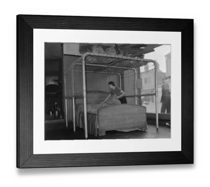 Framed Print : Birmingham furniture store displays in its shop window, a bed air raid protection frame Framed Print : Birmingham furniture store displays in its shop window, a bed air raid protection frame
