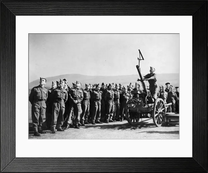 Framed Print : Soldiers of the British Army being trained how to elevate a gun. July 1942 Framed Print : Soldiers of the British Army being trained how to elevate a gun. July 1942