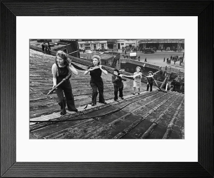 Framed Print : Odeon usherettes at Leicester Square in central London are ready for anything in fire Framed Print : Odeon usherettes at Leicester Square in central London are ready for anything in fire