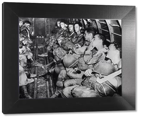 American paratroopers pictured in the C-47 of the Troop Carrier Air Division of