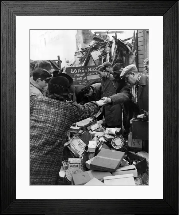 Framed Print : Civilians after an air raid in Coventry. November 1940 Framed Print : Civilians after an air raid in Coventry. November 1940