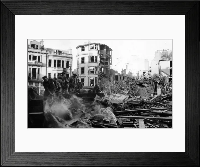 Framed Print : Canadian soldiers help to remove debris from bombed buildings on Hastings. 8th May 1943 Framed Print : Canadian soldiers help to remove debris from bombed buildings on Hastings. 8th May 1943