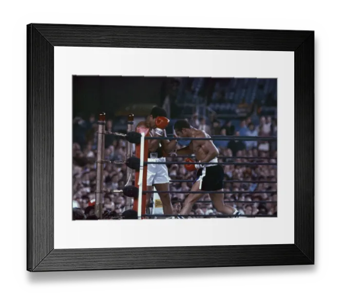 Framed Print : Action during the heavyweight world title fight between Muhammad Ali