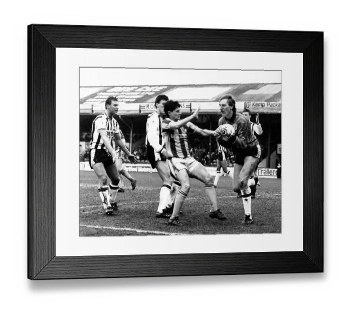 Framed Print : Grimsby town football club Steve Sherwood holds on from Tony Dows March 1989