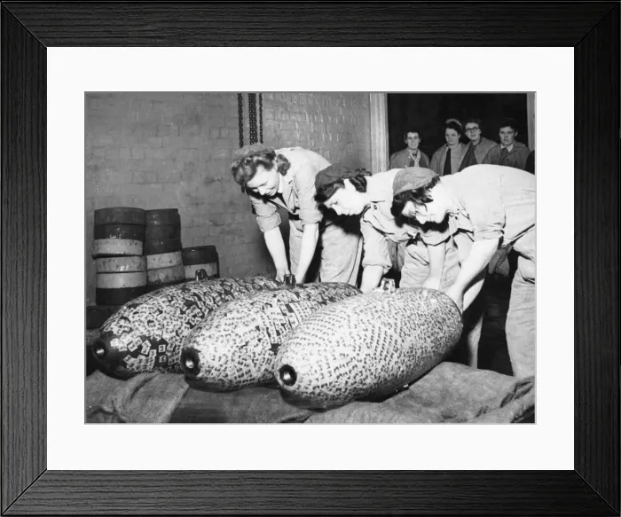 Framed Print : Three 500lb bombs covered in savings stamps purchased during Londons Framed Print : Three 500lb bombs covered in savings stamps purchased during Londons