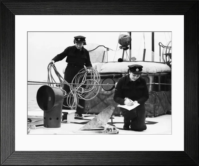 Framed Print : W. A. A. F airwomen on an R. A. F. station checking the equipment on a new boat