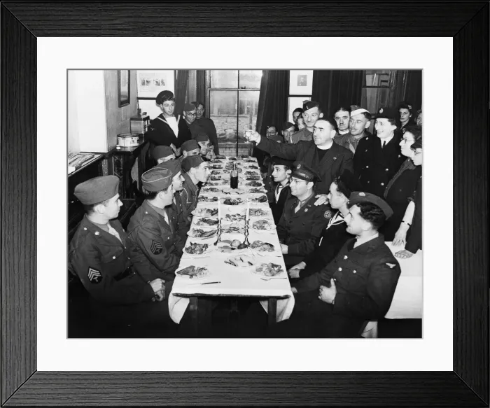 Framed Print : Rev. M. Goodman raises the Kiddush Cup to Jewish troops at a Kosher meal
