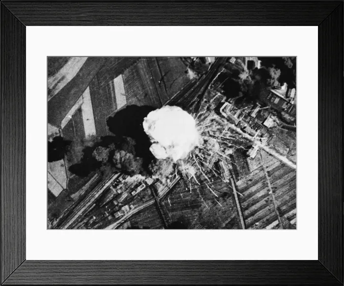 Framed Print : An enemy ammunition train goes up in a puff of white smoke when hit directly in a bombing Framed Print : An enemy ammunition train goes up in a puff of white smoke when hit directly in a bombing