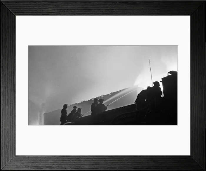 Framed Print : Firefighters tackle a blaze in a Timber Yard in Camberwell, London