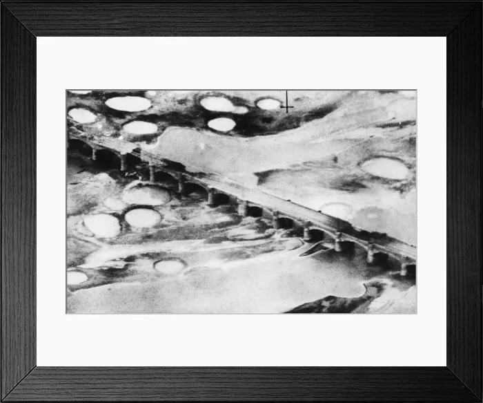 Framed Print : R. A. F. Kittyhawks attack railway bridge at Fano during the Second World War