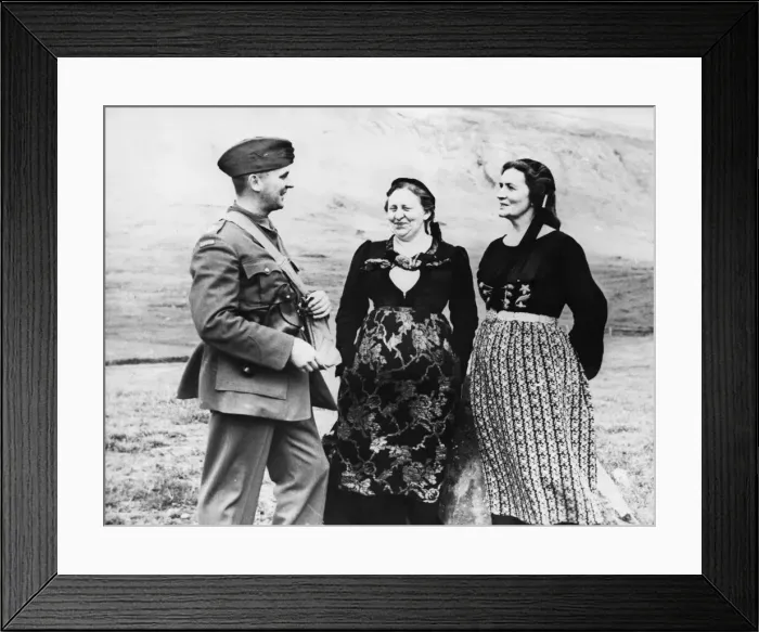 Framed Print : A Canadian officer chats with two Icelandic women in their native costume during Second