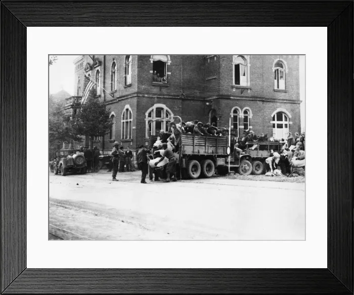 Framed Print : Evacuees are brought into the town of Brand, Germany, where they were registered Framed Print : Evacuees are brought into the town of Brand, Germany, where they were registered