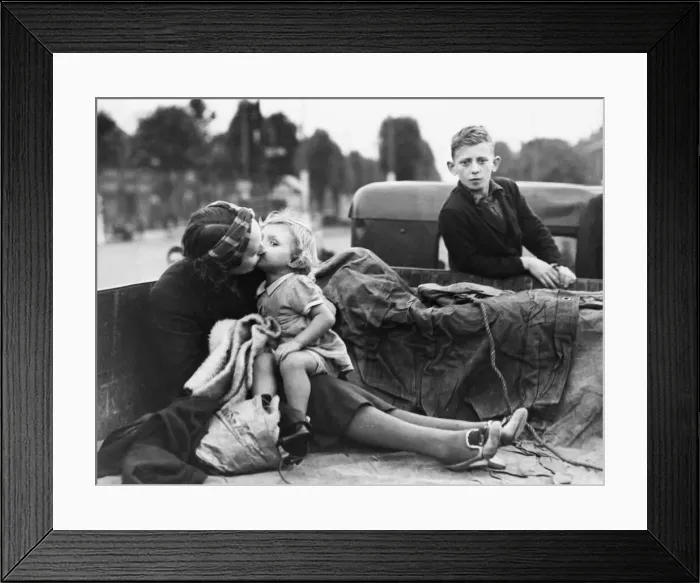 Framed Print : Women and children preparing to evacuate their town before nightfall during Second World Framed Print : Women and children preparing to evacuate their town before nightfall during Second World