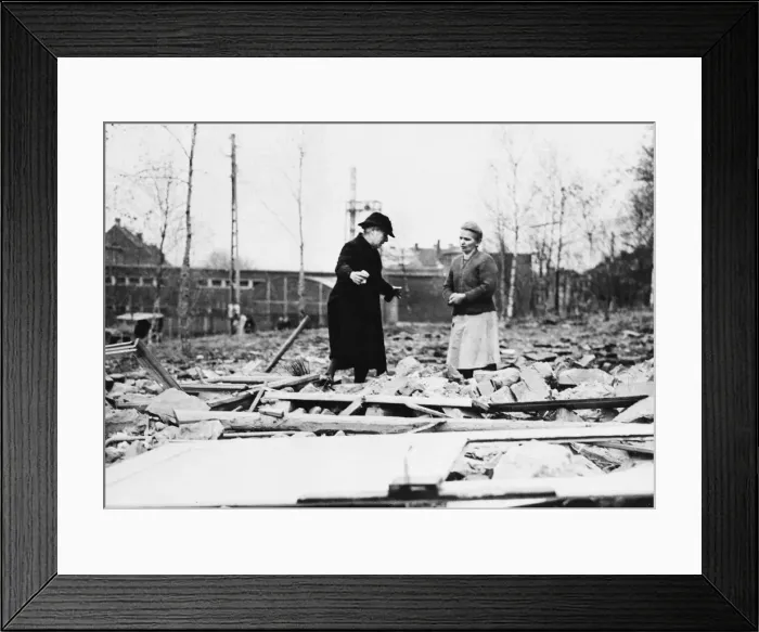 Framed Print : A German civilian views wreckage of her home that was destroyed by a German artillery Framed Print : A German civilian views wreckage of her home that was destroyed by a German artillery