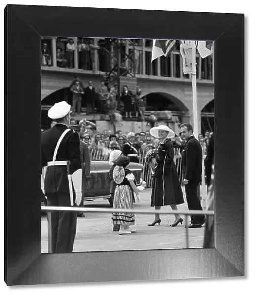 Grace Kelly arrives in Monte Carlo for her wedding to Prince Rainier III in the following